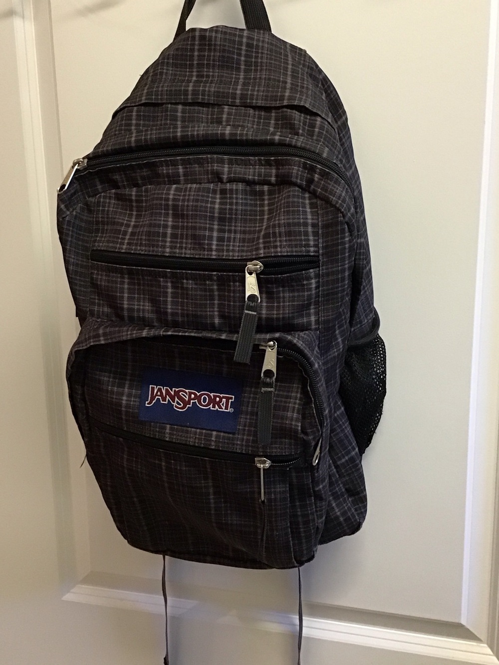 Jansport Black Plaid Backpack with Front Zip Pockets